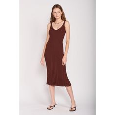 This midi knit dress from Emory Park is a must have this Fall. Made in a lightweight, stretch fabric for comfort wear all day . Features wide straps, a V-neckline and a fitted silhouette. Pair with heels and a jacket for the perfect outfit around town! For a more casual look, pair with tennis shoes and a denim jacket. Spring Midi Seamless Dress, Spring Seamless Midi Dress, Seamless Spring Midi Dress, Casual Seamless V-neck Dress, Casual V-neck Seamless Dress, Medium Wash Mid-length Denim Midi Dress, Casual V-neck Knit Midi Dress, Ribbed V-neck Midi Dress For Date Night, Urban Outfitters Fitted Sleeveless Midi Dress