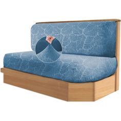 a blue couch with a wooden frame on it's back and the seat cushion is folded down