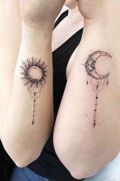 two sun and moon tattoos on the thighs