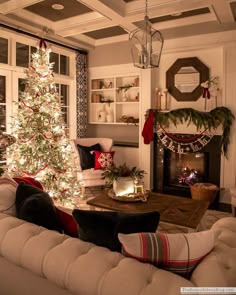 a living room with a christmas tree in the corner