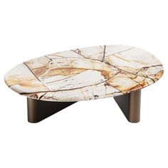 a marble coffee table with black legs and an oval shaped design on the top, against a white background