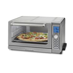 a silver toaster oven with a pizza in it's front door and an electronic timer on the side