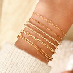 This gold paperclip chain bracelet is a great addition to your everyday jewelry collection! It will be your new go-to statement bracelet. Wear this gold bracelet alone or stack with other chic bracelets. Pair with Laurent Necklace. Gold filled chain Link Size - 3.7 x 13.2 mm Lobster clasp Nickel-free Gold Bracelets Stacked, Chic Bracelet, Gold Ribbons, Solid Gold Jewelry, Statement Bracelet, Gold Filled Jewelry, Everyday Jewelry, Necklace Sizes, Gold Filled Chain