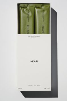 two green shampoos in a white box