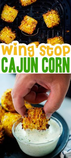 a person dipping corn into a bowl with ranch dressing on the side and text overlay reading wing's stop cajun corn