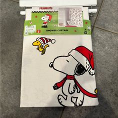 the snoopy christmas stocking is on display