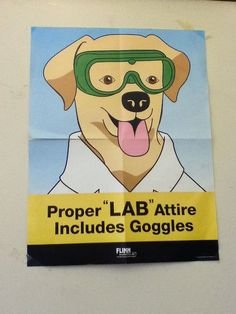 a sign with a dog wearing goggles on it's face that says proper lab attire includes goggles