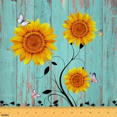 sunflowers and butterflies painted on wooden planks