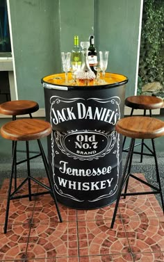 an old fashioned jack daniels bar with stools