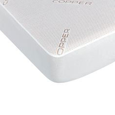 the caspero mattress topper is white and has gold lettering on it