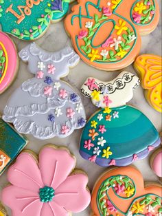 Isabella and Maribel Madrigal’s dresses in sugar cookie form - Encanto themed birthday cookies Encanto Themed Cookies, Isabella Encanto Cookies, Encanto Cookie Ideas, Encanto Decorated Cookies, Isabella Party Encanto, Encanto 3rd Birthday Party, Encanto 2nd Birthday Party, Encanto Dessert Table Ideas, Isabella Birthday Party Encanto