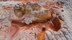 an aerial view of some rocks and dirt