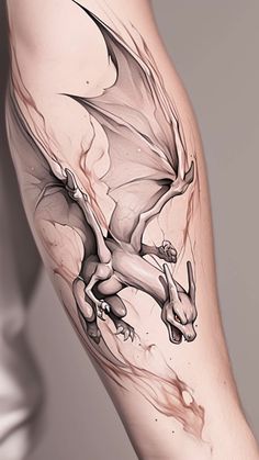 a tattoo with a dragon on the leg