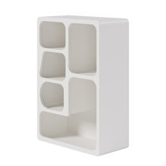 a white shelf with four compartments on each side