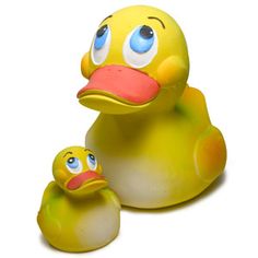 a yellow rubber ducky and its baby chickling