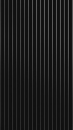 an abstract black and white background with vertical lines