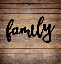 the word family written in black on a wooden background