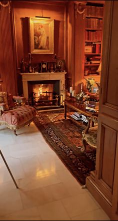 a living room filled with furniture and a fire place in the middle of a room