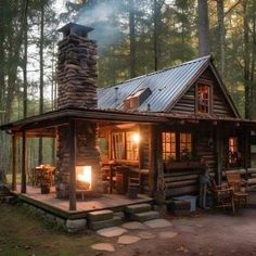 a log cabin in the woods with a fire place on the porch and steps leading up to it