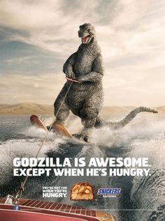 an advertisement featuring a giant gorilla on skis in the ocean with caption that reads, godzilla is awesome except when he's hungry