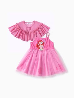 Dress up your little princess with this officially licensed Disney merchandise toddler dress and cape set featuring a mesh cape and princess emblem prints.
* Product features: Set includes one dress and one cape.
* Fabric characteristics: Soft and comfortable.
* Piece of product: 1 Dress and 1 Sheer Cloak Set.
* Sleeves: Sleeveless.
* Style: Disney princess with emblem prints. Toddler Princess Costume Pattern, Pink Princess Dress For Play, Disney Princess Dresses For Kids Target, Disney Princess Fabric, Disney Princess Toddler Bedding, Disney Princess Toddler, Disney Merchandise, Dress Suits, Cloak