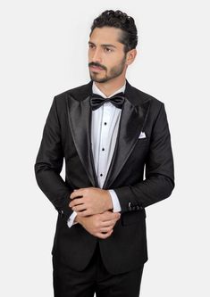 Crafted from a luxurious sharkskin weave wool, the Liberty Black Tuxedo is a sophisticated, statement-making formalwear option. Wide peak lapels in a single button configuration stand out from typical tuxedo styles. Dress to impress with this high-end, premium garment – a modern blend of elegance and refinement. Luxury Single-button Tuxedo With Flat Front, Luxury Single-button Tailored Tuxedo, Luxury Single-breasted Tuxedo With Shawl Collar, Designer Black Single-breasted Tuxedo, Elegant Black Single-breasted Tuxedo, Tuxedo Styles, Suit Guide, Styles Dress, Blue Tuxedos