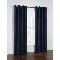 the curtain is open and ready to be hung in front of a window with wood flooring