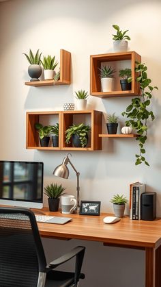 a wooden desk topped with a computer and lots of potted plants