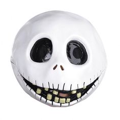 a white mask with black eyes and teeth