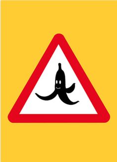 an upside down sign with a black octopus on it's back and red bottom