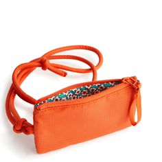 Keep your essentials close at hand with our Zip Card Pouch Lanyard. Perfect for those who want to travel light and hands-free, this stylish accessory combines the convenience of a card case with the functionality of a lanyard, allowing you to carry your cards and ID with ease wherever you go. Vera Bradley Zip Card Pouch Lanyard in Orange Backpack Lunch Bag, Card Pouch, Duffel Bag Backpack, Vera Bradley Wallet, Belt Purse, Toiletry Bag Travel, Slipper Socks, Mini Purse, Travel Light