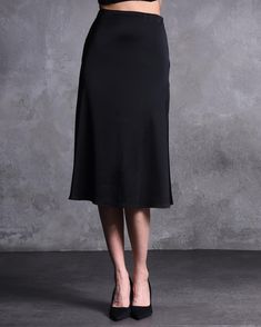 Step up your style game with this Black Satin High-Waisted Midi Skirt, designed for women who love a touch of elegance in their wardrobe. This sleek and sophisticated satin skirt is perfect for cocktail parties, evening events, or any special occasion where you want to stand out. Its high-waisted design and luxurious fabric create a flattering silhouette, making it a must-have for your formal wardrobe. 💫 🌟 Unique Features: 👠 High-Waisted Design: Cinches at the waist to create a flattering and Satin Lined Cocktail Skirt, Formal Knee-length Satin Skirt, Black Satin Flared Skirt, Luxury Satin Knee-length Skirt, Relaxed Black Satin Skirt, Skirts Midi High Waisted, Satin Skirt, Cocktail Party, Black Satin