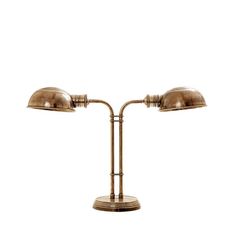 an antique brass table lamp with two lamps on each side and one light on the other