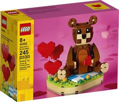 a lego box with a bear sitting on top of it