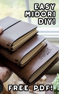 a person holding two brown notebooks with the text easy midori diy