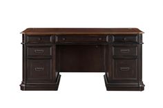 an executive desk with two drawers on the top and one drawer open, in dark wood