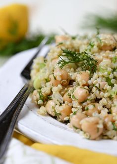 a white plate topped with rice and beans