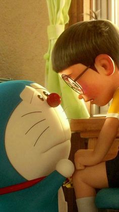 a young boy sitting on top of a chair next to a cartoon character wearing glasses