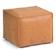 a brown leather square ottoman sitting on top of a white floor