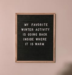 a black and white sign that says, my favorite winter activity is going back inside where it is warm