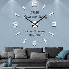 a living room wall clock with the words time spent with family is worth every second