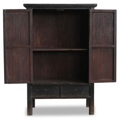 an open bookcase with three doors and two drawers on one side, in dark wood