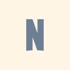 the letter n is made up of two blue rectangles on a beige background