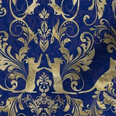 a blue and gold wallpaper with an ornate design