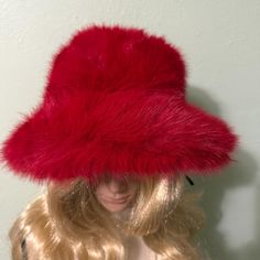 Beautiful Red Fluffy Hat. Very Soft and Warm. Fun Hat that is Fun to Wear.  Great addition to your wardrobe for Fall and Winter. It will keep you warm and make a fashion statement. This Hat is an Absolute Stunner it will turn heads.  Shape: Pom Pom Hat Size: small to medium Ribbon band adjusts to head size Material: Polyester Fluffy Hat, Fun Hat, Pom Pom Hat, Cool Hats, Hat Sizes, Fedora, Fashion Statement, Caps Hats, Accessories Hats