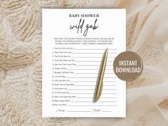 a baby shower wish list with a pen