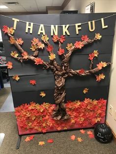 a sign with leaves on it that says, thank you for the fall season and has a tree made out of branches