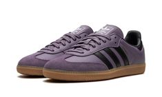 The Women’s adidas Samba OG “Shadow Violet” is a women’s colorway of the retro indoor soccer sneaker with a purple-based appearance.  The shoe is complete with a Shadow Violet leather upper and tonal suede overlays.  The Three Stripes branding on either side of the shoe is rendered in black leather.  A gold “Samba” logo appears on the lateral side of the mid-panel.  Classic adidas insignia is found on the tongue.  A gum rubber sole finishes off the appealing colorway.  Release date: August 15, 2 Purple Adidas Shoes, Purple Sambas, Dark Purple Shoes, Adidas Shoes Samba, Stripes Branding, Purple Adidas, Classic Adidas, Adidas Purple, Pretty Shoes Sneakers