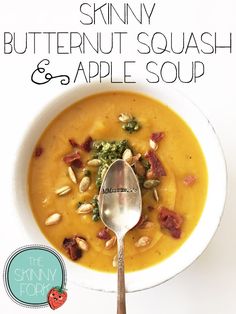 a bowl of soup with a spoon in it and the words skinnyy butternut squash and apple soup