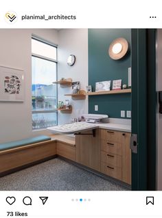 a room with shelves, cabinets and a sink in it that is on instagram